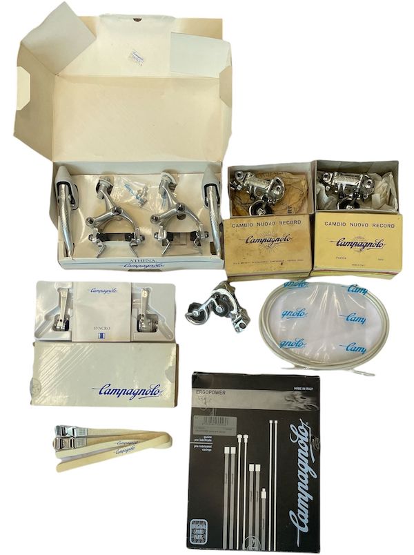 Assorted vintage Campagnolo cycling brake sets and brake line, estimated at $200-$400