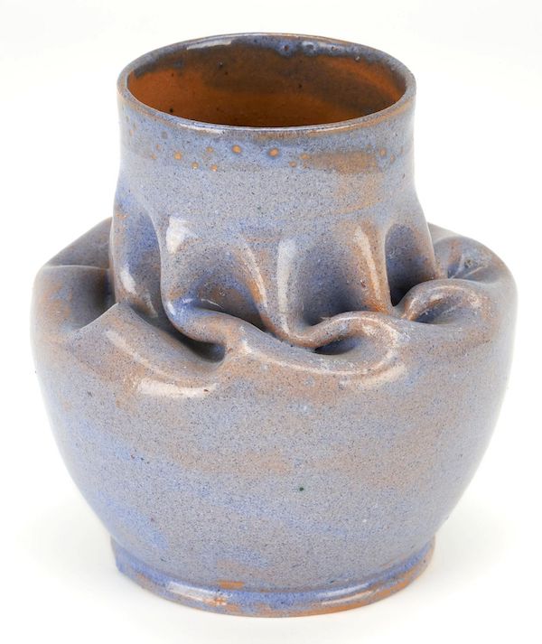 George Ohr art pottery vase with an in-body twist, estimated at $4,400-$4,800. Image courtesy of Case and LiveAuctioneers