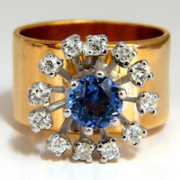 14K gold ring with a natural tanzanite surrounded by rays tipped with diamonds, estimated at $1,000-$1,200
