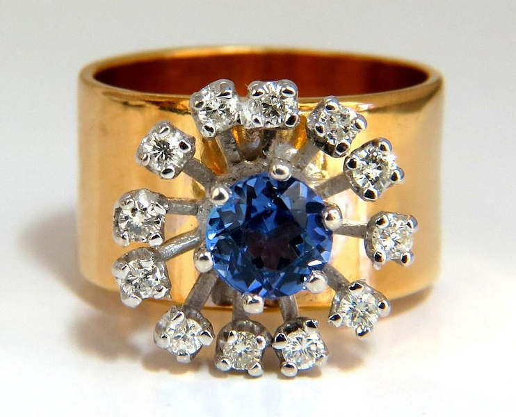 14K gold ring with a natural tanzanite surrounded by rays tipped with diamonds, estimated at $1,000-$1,200 