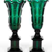 Boston & Sandwich Glass Co. pair of pillar-molded cut-notch tulip vases in deep emerald green, estimated at $8,000-$12,000