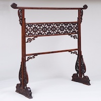 Chinese carved hardwood clothing stand, which hammered for $830,000 against an estimate of $500-$700. Image courtesy of STAIR