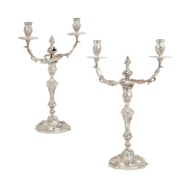 Pair of George III sterling silver two light candelabra by William Tuite, London, 1764, estimated at $10,000-$20,000