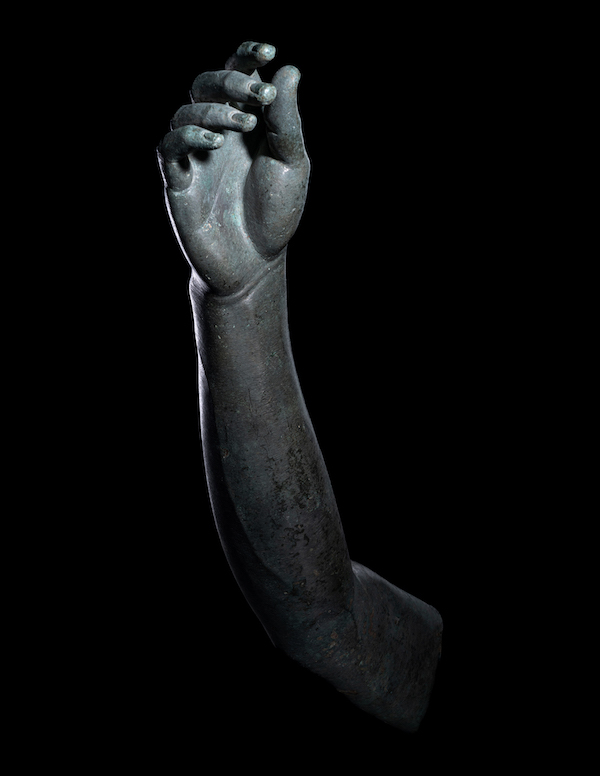 Greek bronze right arm, $94,500. Image courtesy of Hindman