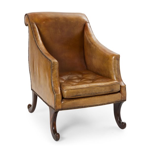 Late Regency brass studded leather and stained beechwood library armchair, estimated at $800-$1,200
