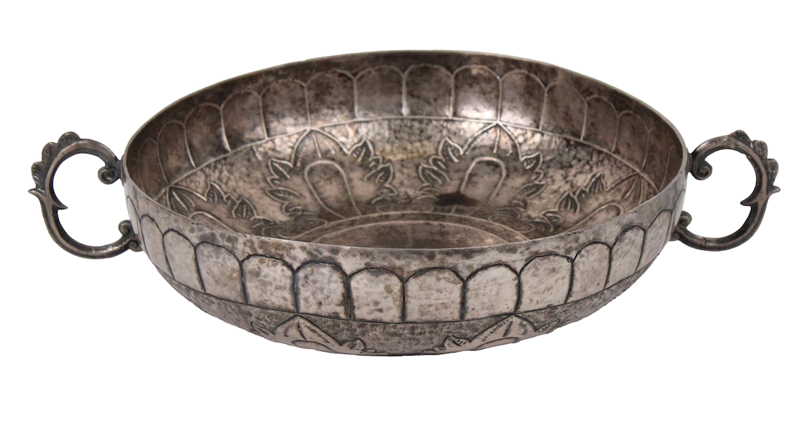 Monumental Spanish Colonial silver ceremonial bowl, estimated at $2,000-$3,000. Image courtesy of Nye & Company Auctioneers