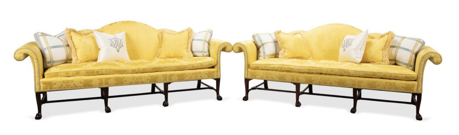 Pair of Kindel Irish Georgian Collection camelback sofas, $12,100. Image courtesy of Ahlers & Ogletree Auction Gallery