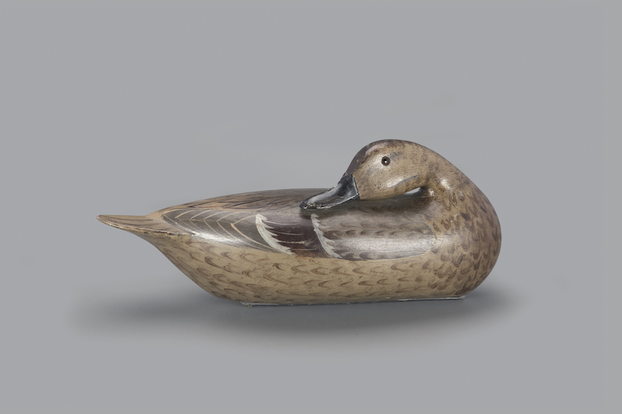 Preening pintail hen decoy by Charles Perdew, estimated at $70,000-$100,000. Image courtesy of Copley Fine Art Auctions