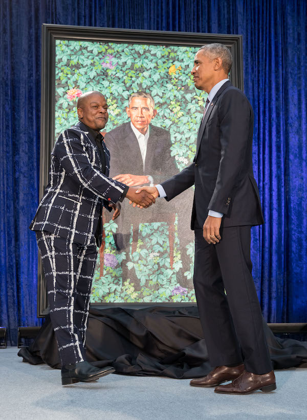 Kehinde Wiley shakes the hand of his sitter, Barack Obama, during the February 2018 unveiling of the former president’s portrait at the National Portrait Gallery in Washington, DC. Image courtesy of the National Portrait Gallery, photo credit Pete Souza