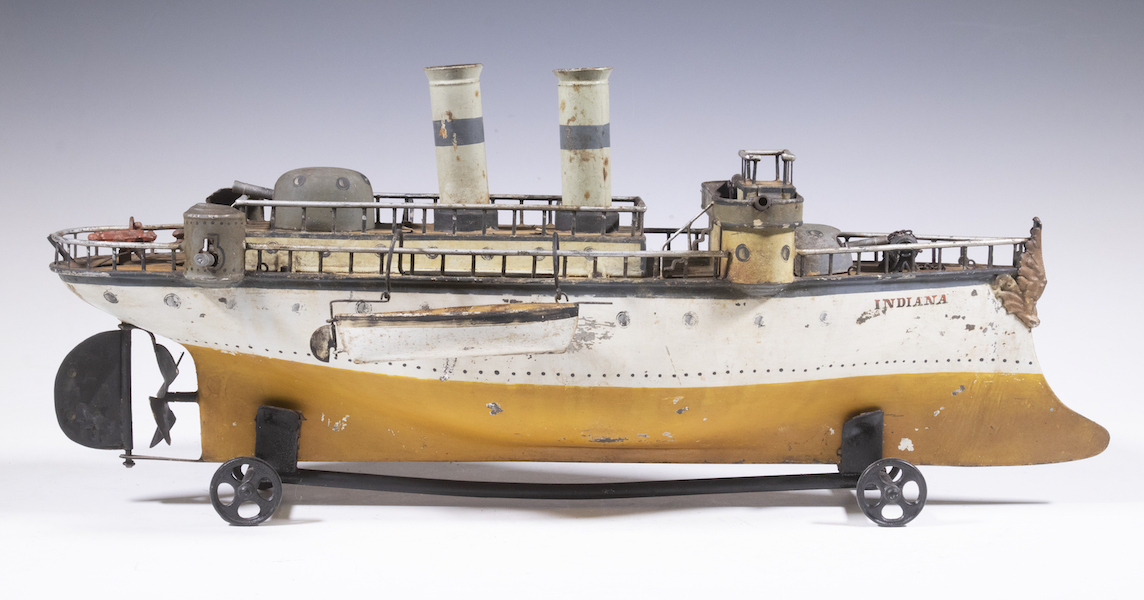 Circa-1900 German toy clockwork battleship, $16,800. Image courtesy of Thomaston Place Auction Galleries