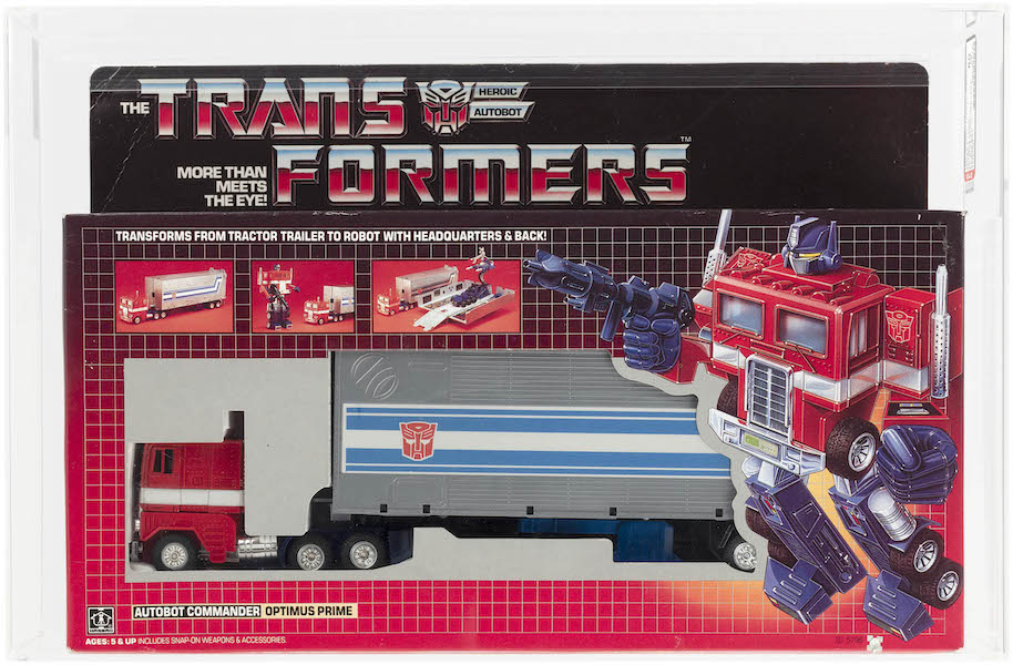 Hasbro, 1984, Transformers Series 1 Optimus Prime Autobot Commander in rare ‘overprint’ box with Trademark logo as opposed to less-rare Registered logo, AFA 80 NM (Error Box / Light Blue Trailer). One of only three sealed examples graded by AFA. Extremely hard-to-find toy in original factory state due to brief production run before errors were corrected. Estimate $35,000-$50,000. Image courtesy of Hake’s Auctions