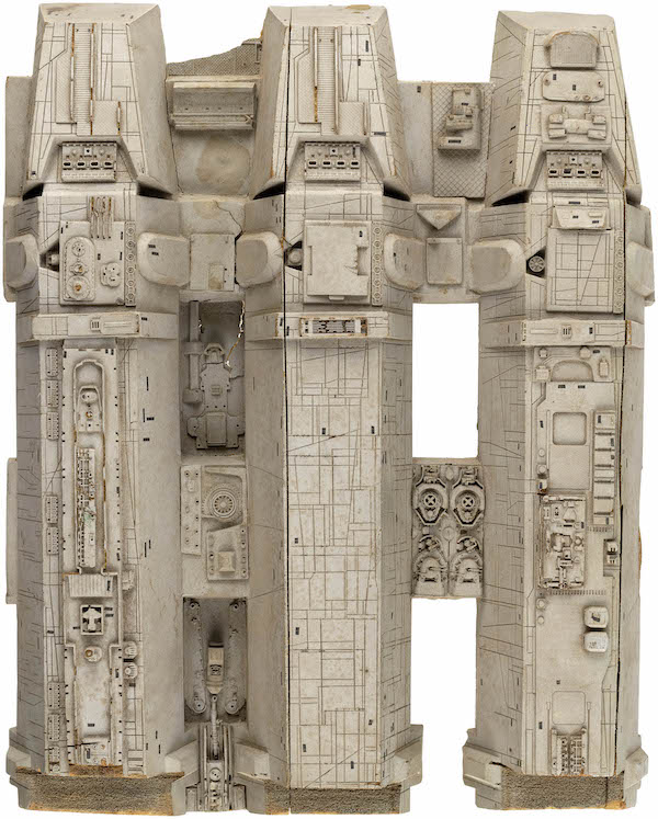Original movie prop from ‘Star Wars: Episode IV – A New Hope: Destruction of the Death Star,’ used in film’s climactic ‘Trench Run’ sequence in which Luke Skywalker and other Rebel Alliance pilots navigate perilous conditions to ultimately destroy the Death Star. Painted polyurethane foam panel crafted circa 1977 by Industrial Light & Magic’s model miniature department. Size: 17.25in x 22in x 4in deep. Estimate: $35,000-$50,000. Image courtesy of Hake’s Auctions