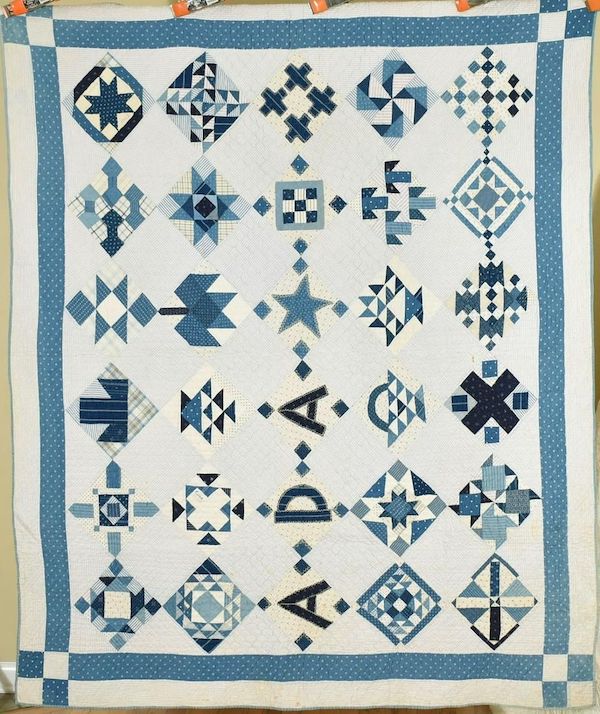 Blue and white cotton sampler quilt dating to 1918, estimated at $1,200-$1,500