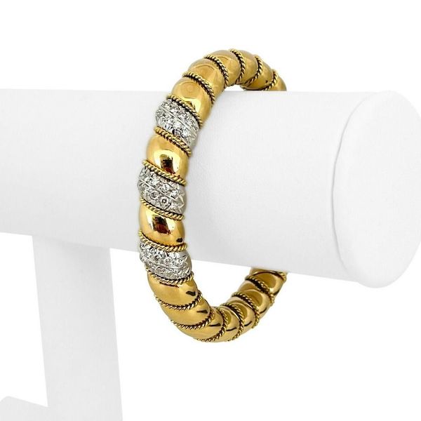 Diamond and 18K yellow and white gold cuff bracelet by Sabbadini, estimated at $5,500-$7,000