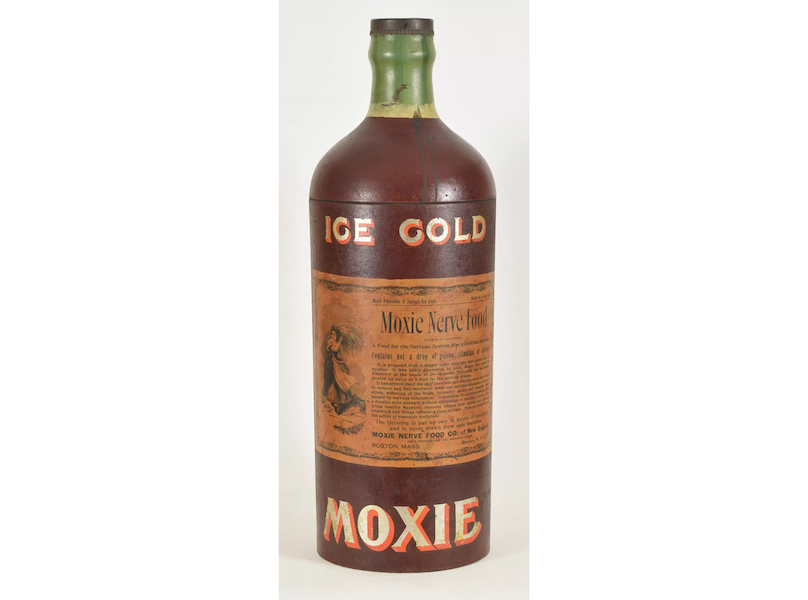 A bottle-shaped Moxie tabletop advertising cooler or dispenser with its original paint decoration, label and tin cap realized $1,800 plus the buyer’s premium in December 2020. Image courtesy of Tremont Auctions and LiveAuctioneers
