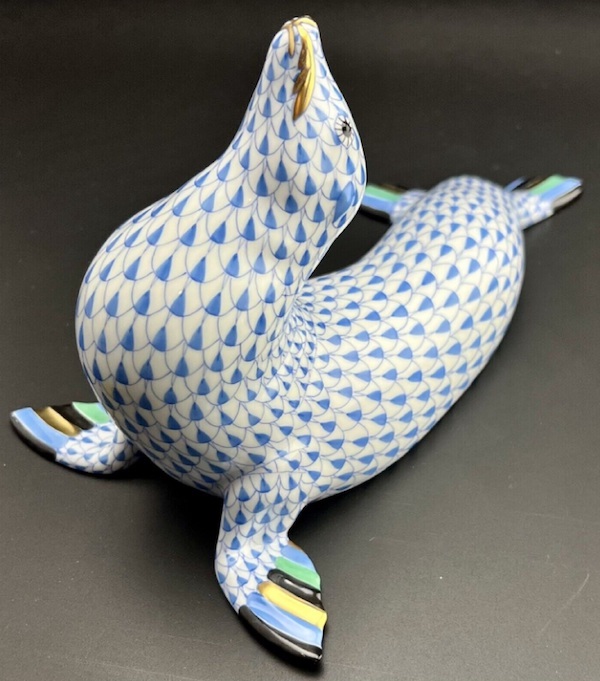 Signed Herend XL sea lion in the blue Fishnet pattern, estimated at $750-$1,500 