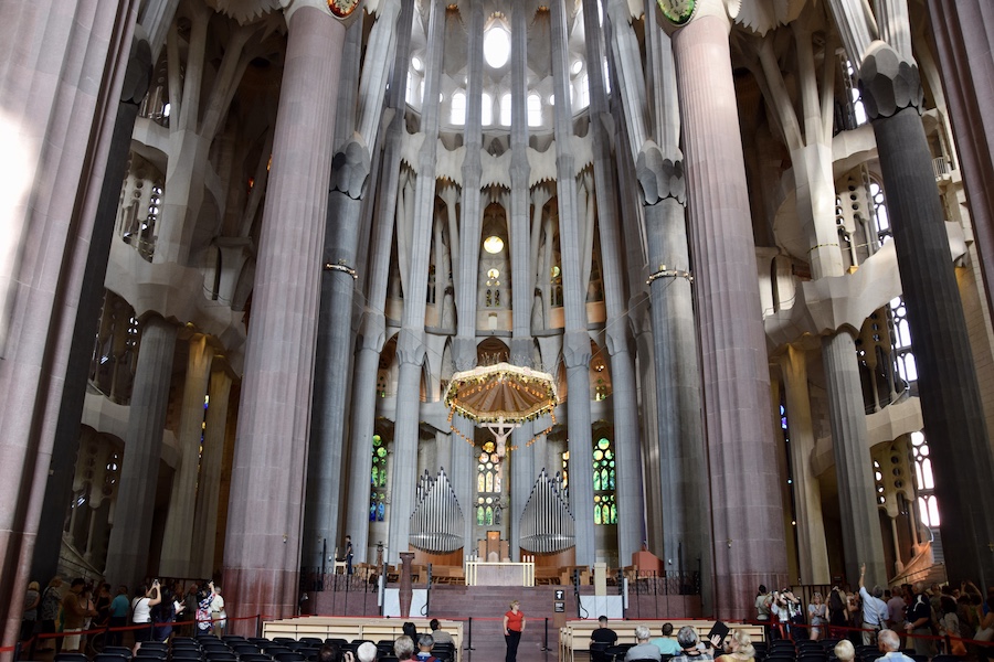 Interior of the Sagrada Familia Basilica in Barcelona, Spain, designed by Antoni Gaudi, photographed in September 2014. It is among the many iconic churches and religious buildings in Europe that have struggled to remain functional as sites of worship while also welcoming tourists. Image courtesy of Wikimedia Commons, photo credit Ank Kumar. Shared under the Creative Commons Attribution-Share Alike 4.0 International license.