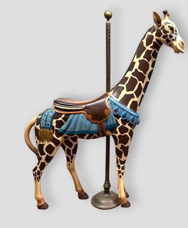 Restored carved and painted carousel giraffe, attributed to Herschell-Spillman, $7,380. Image courtesy of Neue Auctions