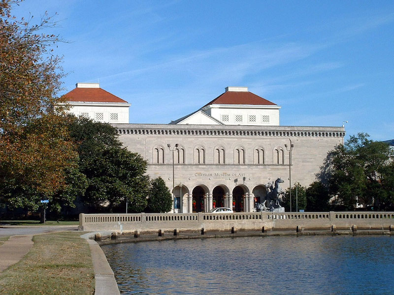Undated photo of the Chrysler Museum of Art in Norfolk, Va. In July, it unveiled a bronze plaque that acknowledges the Indigenous Peoples who had held the land on which the museum sits. Image courtesy of Wikimedia Commons, photo credit Gosscj at English Wikipedia, who has released it into the public domain.