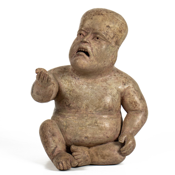 Olmec figure of a baby, estimated at $12,000-$18,000. Image courtesy of Clars Auction Gallery
