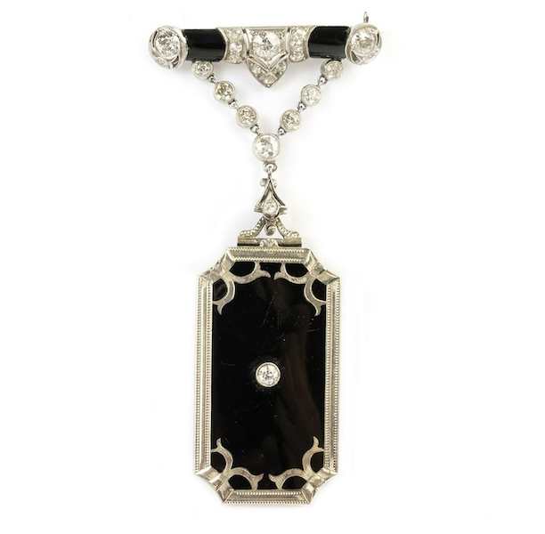 Art Deco 18K white gold, platinum, enamel, diamond and black onyx brooch, estimated at $1,000-$1,500. Image courtesy of Michaan’s Auctions and LiveAuctioneers