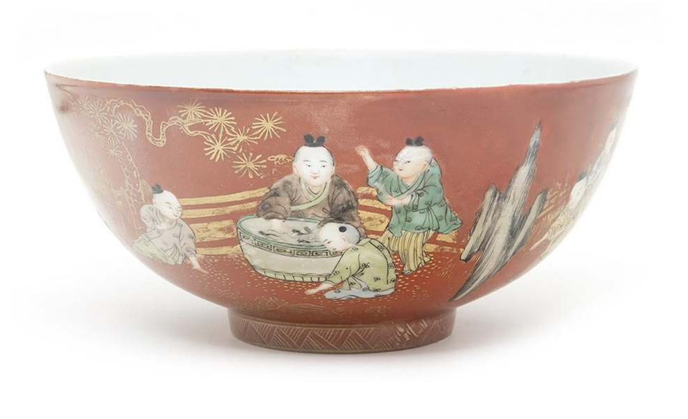 Large Chinese ruby ground famille rose porcelain bowl, estimated at $1,000-$1,500. Image courtesy of Michaan’s Auctions and LiveAuctioneers