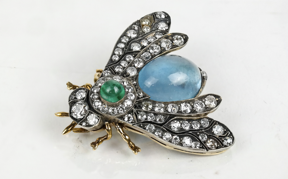 Antique diamond, emerald and aquamarine pin, $5,312. Image courtesy of Roland Auctions NY