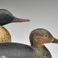Detail of rigmate pair of red-breasted mergansers by Elmer Crowell, estimated at $80,000-$120,000. Image courtesy of Guyette & Deeter, Inc.