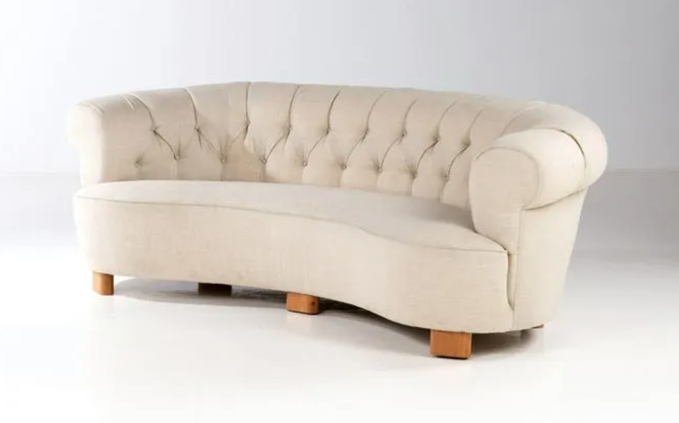 A circa-1930 curved beechwood sofa by Greta Magnusson Grossman brought €8,000 (around $8,907) plus the buyer’s premium in October 2020 at Piasa. Image courtesy of Piasa and LiveAuctioneers.