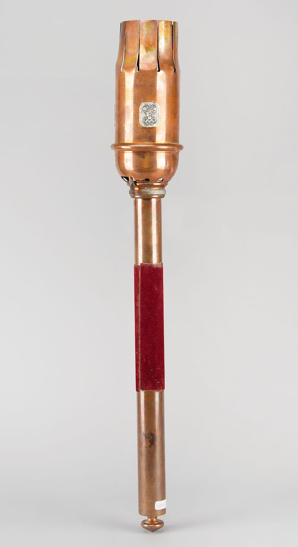 Fashioned from a rose gold bronze alloy, the Olympic torch was the work of the Societe Technique d'Equipement et de Fournitures Industrielle (STEFI). Image courtesy of RR Auction