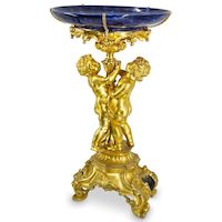 Monumental 19th-century French gilt bronze and porcelain centerpiece, estimated at $500-$5,000.