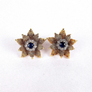 Pair of 18K gold Tiffany & Co. diamond and sapphire earrings, estimated at $2,500-$3,500 at Roland Auctions.