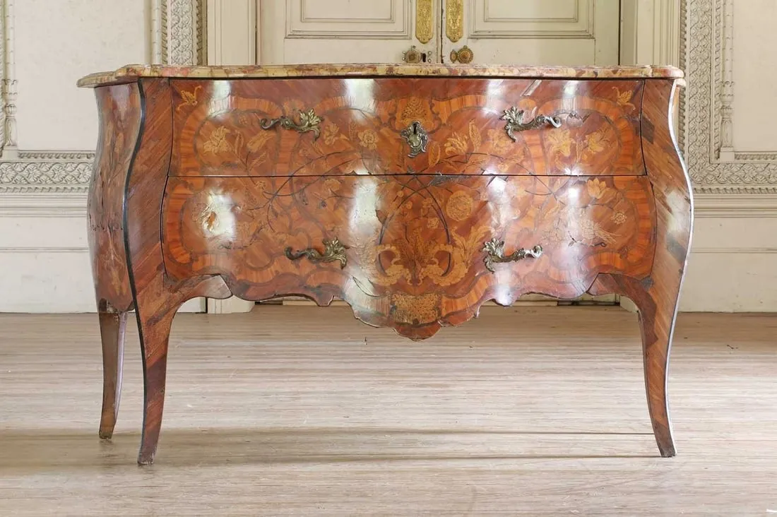A Louis XV floral marquetry bombe commode with Breccia marble top with an estimate of £8000-£12,000 at Sworders’ auction at Elveden Hall.
