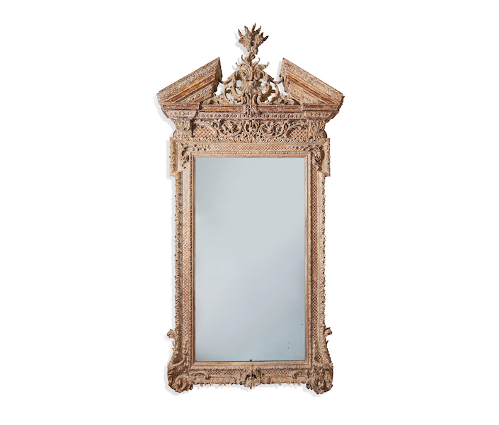 George II carved giltwood pier mirror, estimated at £40,000-£60,000 ($50,900-$76,400). Image courtesy of Dreweatts