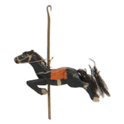 Leaping black horse from a set of six wooden figures carved in the 1930s by sideshow star Johnny Eck, which sold for $4,250 at Potter & Potter Auctions.