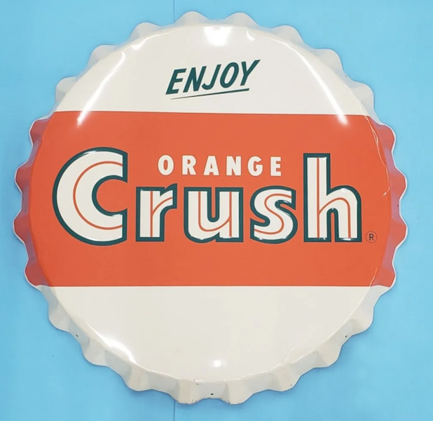 A large Enjoy Orange Crush sign in the shape of a bottle cap, measuring 39in, brought $5,250 plus the buyer’s premium in October 2021. Image courtesy of Rockabilly Auction Company and LiveAuctioneers.