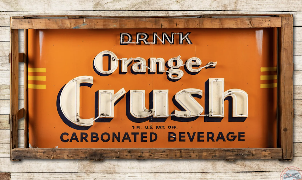 Discovered in its shipping crate was a new old stock 8ft metal Orange Crush sign using neon lettering that attained $165,000 plus the buyer’s premium in February 2023. Image courtesy of Richmond Auctions and LiveAuctioneers.