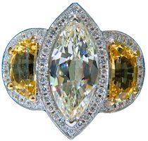 18K white gold ring centered on a 3.50-carat diamond with flanking yellow sapphires, all three GIA certified, estimated at $36,000-$43,000 at Jasper52.