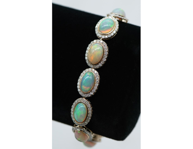 An opal, diamond and 14K gold bracelet featuring 22.81 carats of opals earned $5,500 plus the buyer’s premium in September 2021. Image courtesy of J. Garrett Auctioneers and LiveAuctioneers.