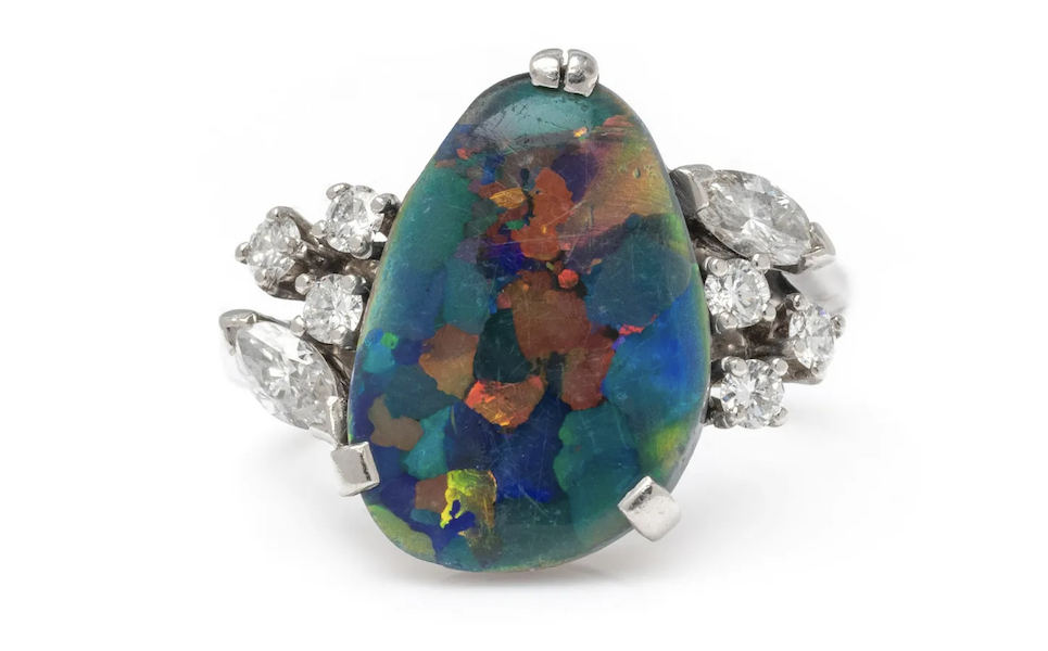 A freeform-cut large precious black opal, diamond and platinum ring designed by Raymond Yard reached $7,000 plus the buyer’s premium in September 2022. Image courtesy of Hindman and LiveAuctioneers.