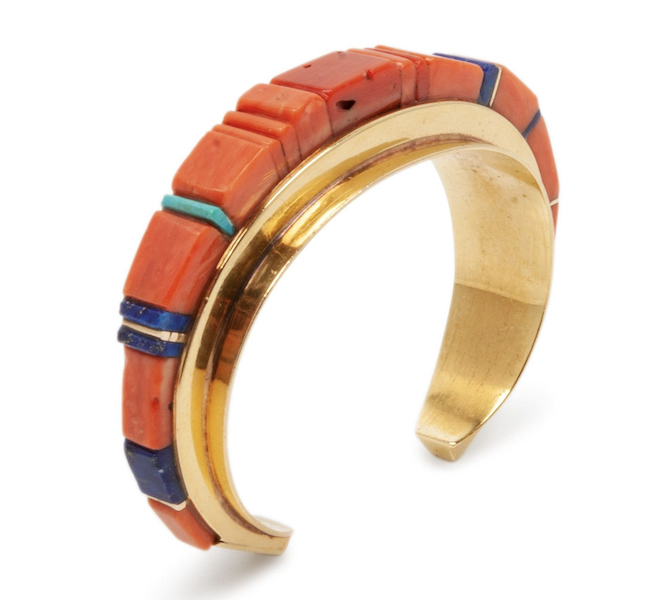A signed Charles Loloma 18K gold, coral, turquoise and lapis lazuli inlay cuff bracelet brought $16,000 plus the buyer’s premium in June 2020. Image courtesy of Hindman and LiveAuctioneers.