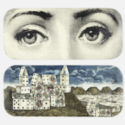 A pair of Piero Fornasetti Occhi and Citta di carte trays sold at the high estimate for $1,000 plus the buyer’s premium in July 2023. Image courtesy of Rago Arts and Auction Center and LiveAuctioneers.