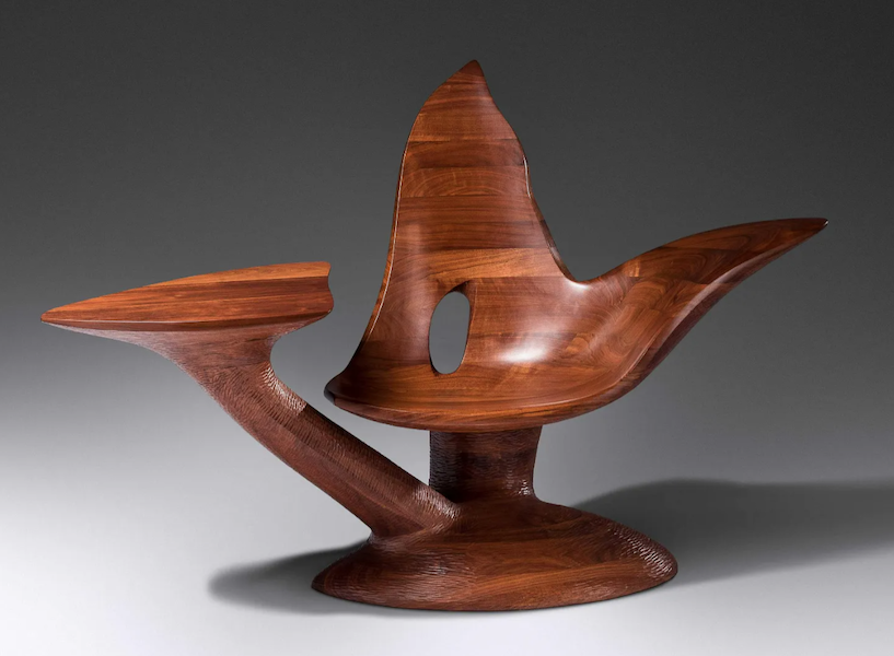 Wendell Castle’s later machine-worked furniture standouts include a Too Soon walnut chair dating to 2005, which sold for $60,000 plus the buyer’s premium in March 2021. Image courtesy of Hindman and LiveAuctioneers.