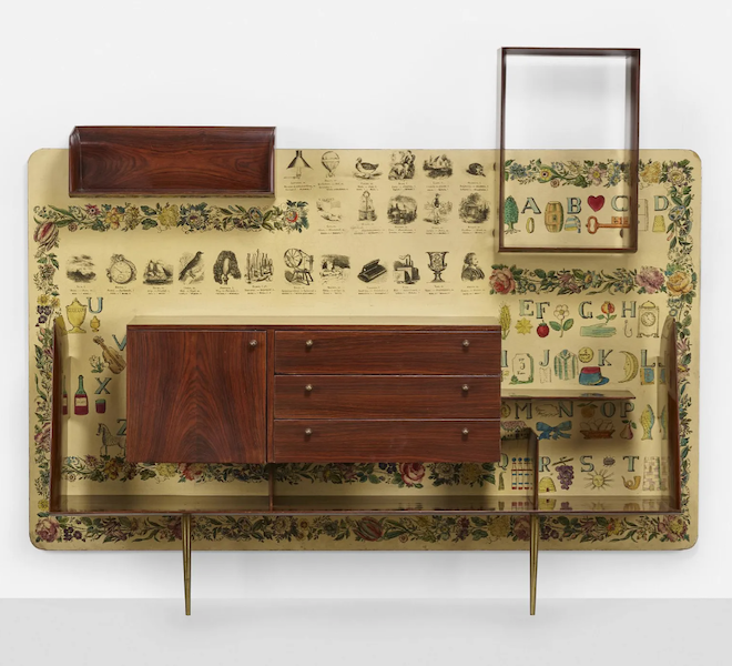 A wall unit boasting decoration by Piero Fornasetti brought $50,000 plus the buyer’s premium in November 2022. Image courtesy of Los Angeles Modern Auctions (LAMA) and LiveAuctioneers.