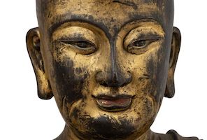 Detail of a large Chinese gilt-bronze figure of a Luohan, estimated at $10,000-$20,000, which hammered for $750,000 and sold for $967,500 at DuMouchelles.