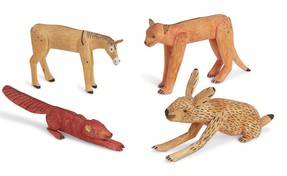 Four carved wood animals by Manuel Jimenez Ramirez, $4,375