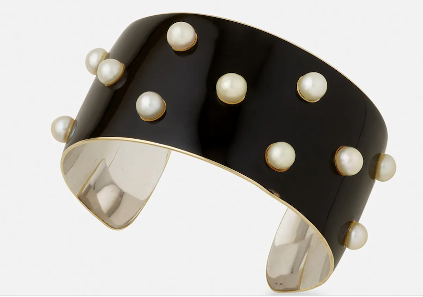 A cultured pearl and black enamel Boivin cuff bracelet realized $7,000 plus the buyer’s premium in June 2022. Image courtesy of Rago Arts and Auction Center and LiveAuctioneers.