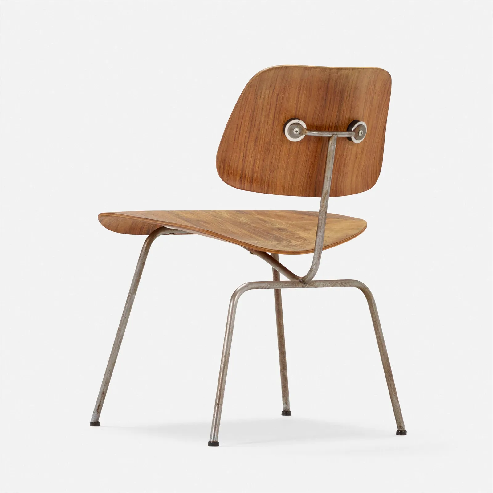 An early Charles and Ray Eames DCM chair by Evans Plywood Division. $28,000 at Los Angeles Modern Auction.