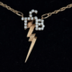 Elvis Presley-gifted Diamond and 14K Taking Care of Business in a Flash necklace, $200,000-$225,000 at GWS Auctions.