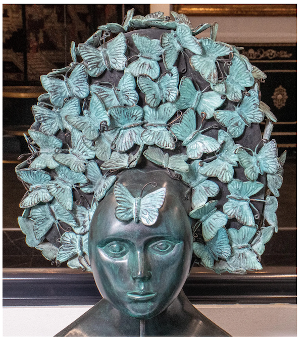 Sergio Bustamante’s ‘Lady with Butterflies’ bronze (detail image shown here) sold well above its high estimate at $6,000 plus the buyer’s premium in May 2022. Image courtesy of Auctions at Showplace and LiveAuctioneers.